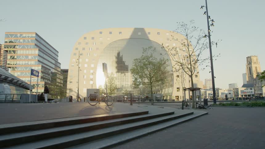 The buildings sit near the park