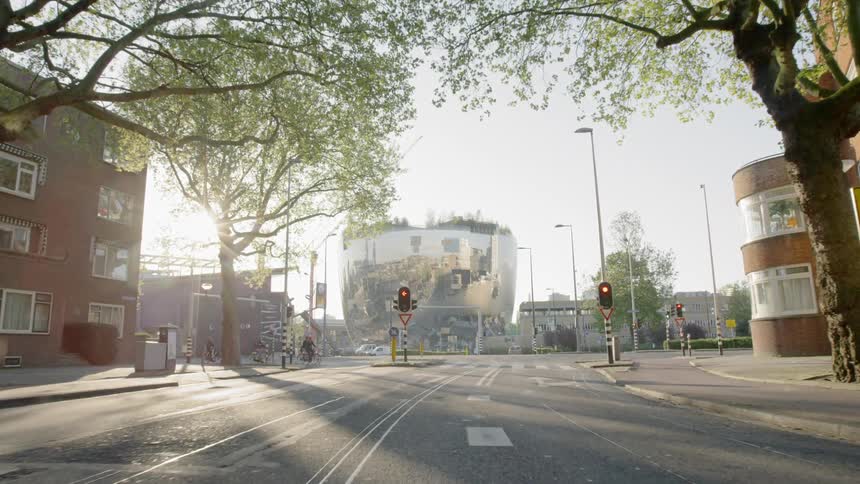 A wide street in a city on a sunny day