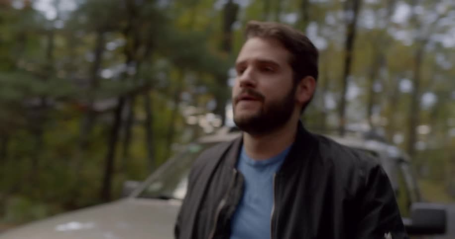 A man hurried exiting a vehicle and running forward only to stop and look on in disappointment