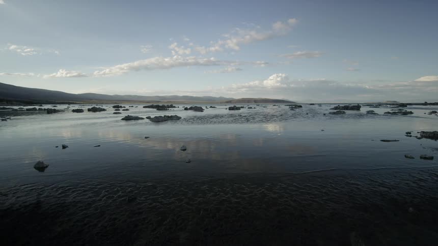 View of some shallow water with rocks all over