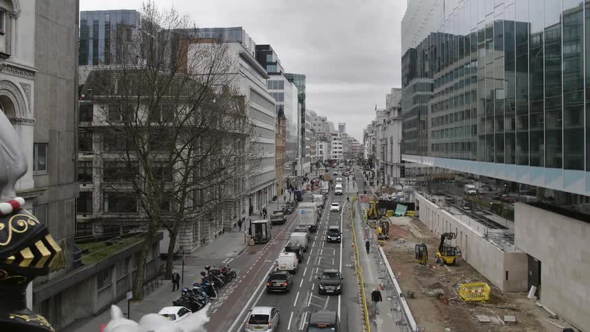 A busy street in a metropolis during the day