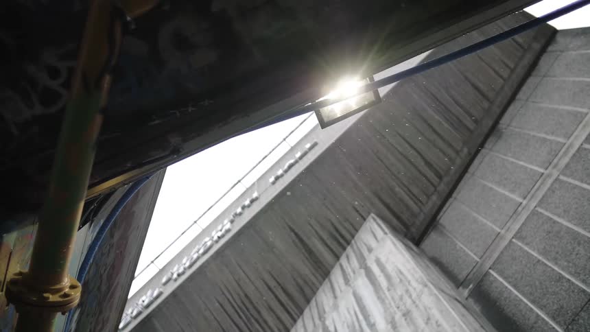 A building being wet by rain