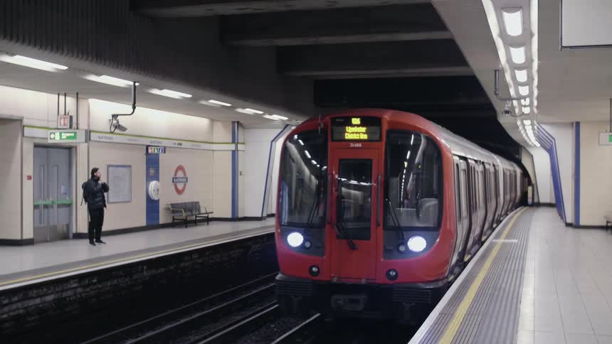Train travels through the tunnel and arrives at the station below the ground