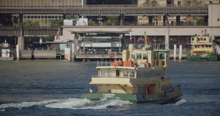 A boat is driving in the ocean