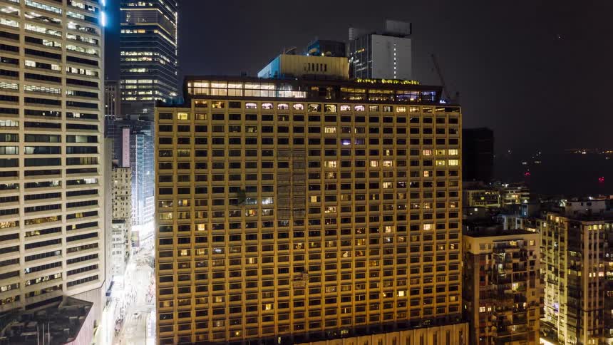 A city bustles with life during nighttime