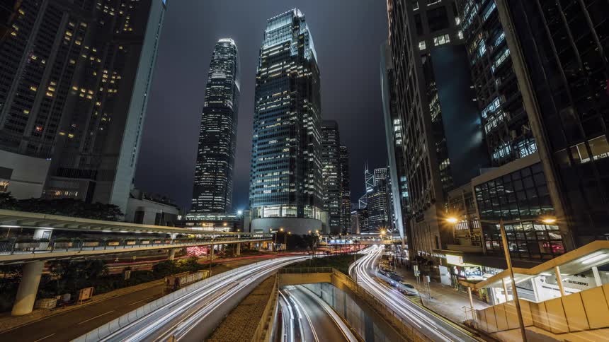 Time lapse of vehicles driving down a city street