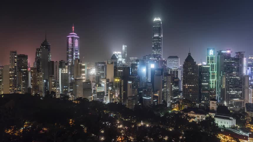 Skyline of the city with illuminated tall buildings and skyscrapers at night