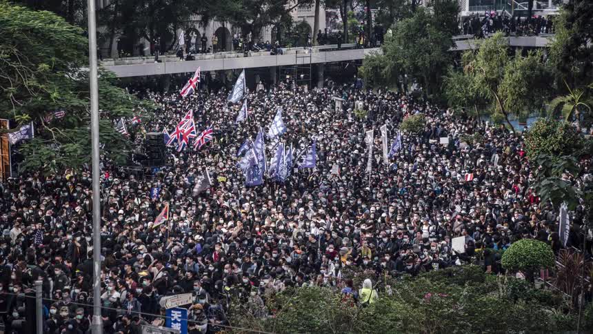 Demonstrators march to show that they disagree something or someone