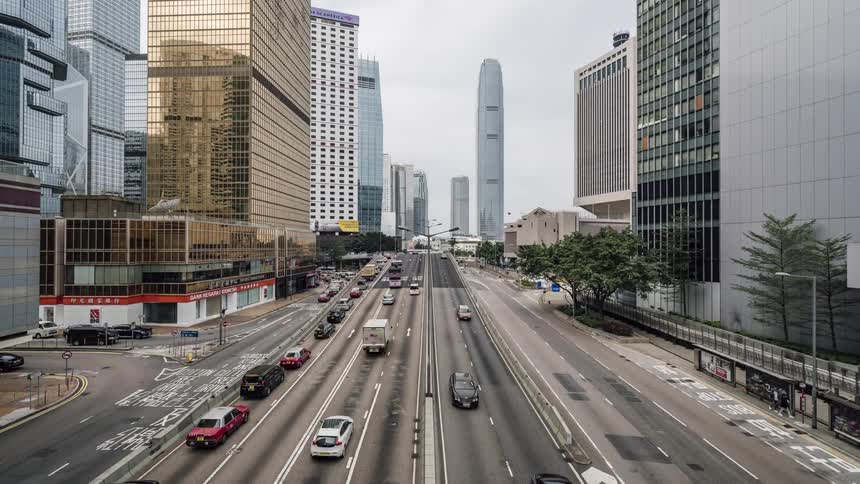 Vehicles drives along roads in the city