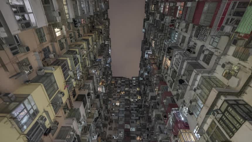 Buildings with windows balconies and air conditioning units