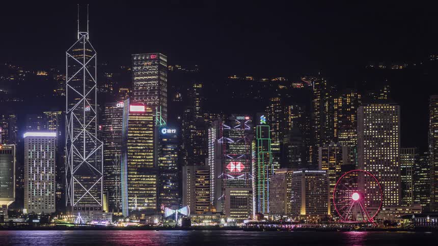 Light animations on the sides of skyscrapers at night