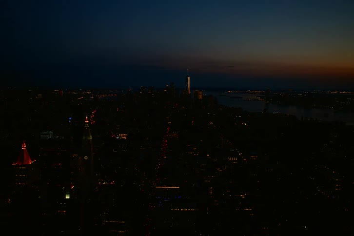 Time lapse of city skyline from sunset to night