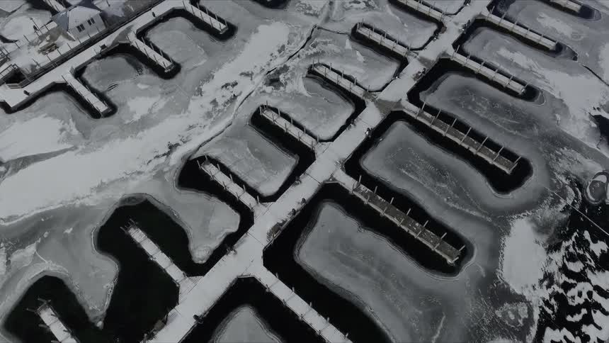 A pier covered in ice and snow