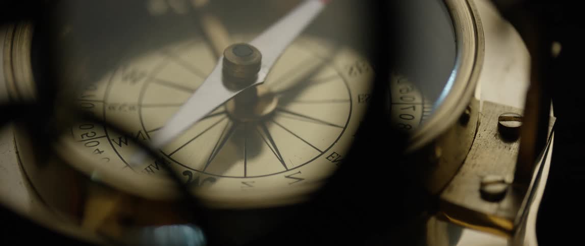 A compass is spinning to see the direction