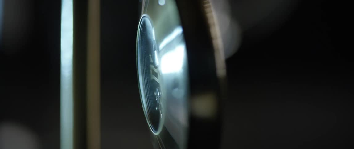A beautifully crafted pocket watch with exposed gears and works