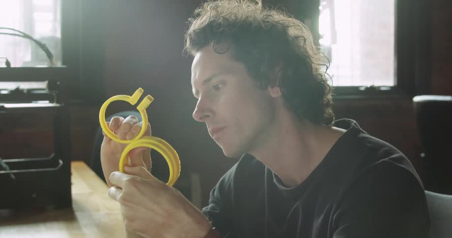 A man figures out how to connect pieces