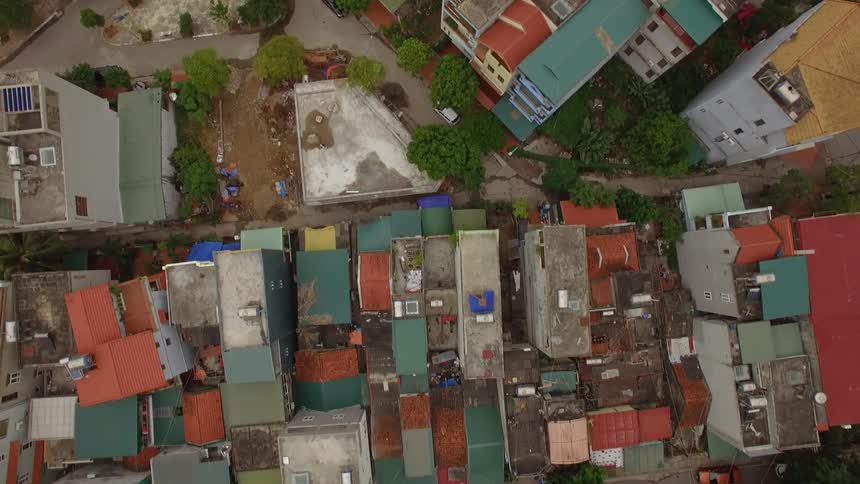 An aerial view of a 3rd world country is displayed