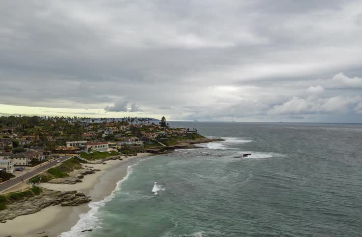 The coastline of a city on a cloudy day