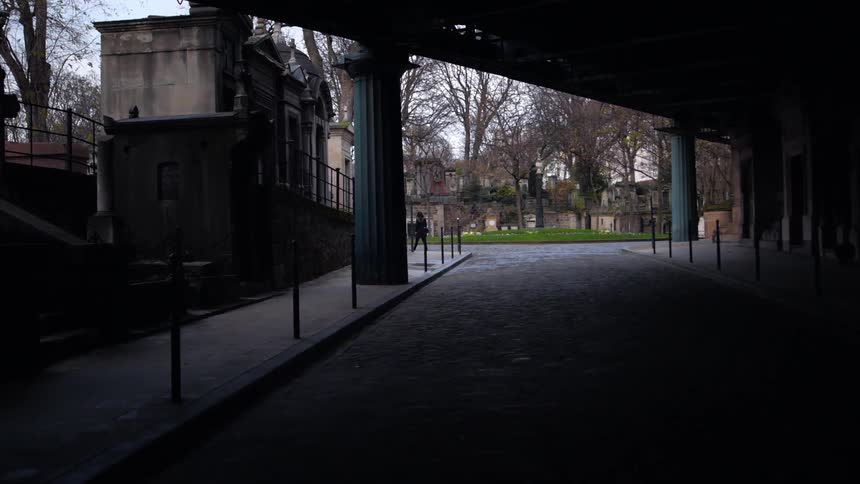 A person walks down an empty street