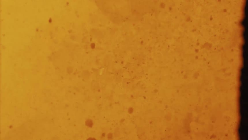 Yellow liquid boiling forming various shapes