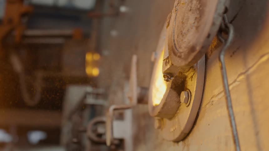 The hot ash blows out of the furnace