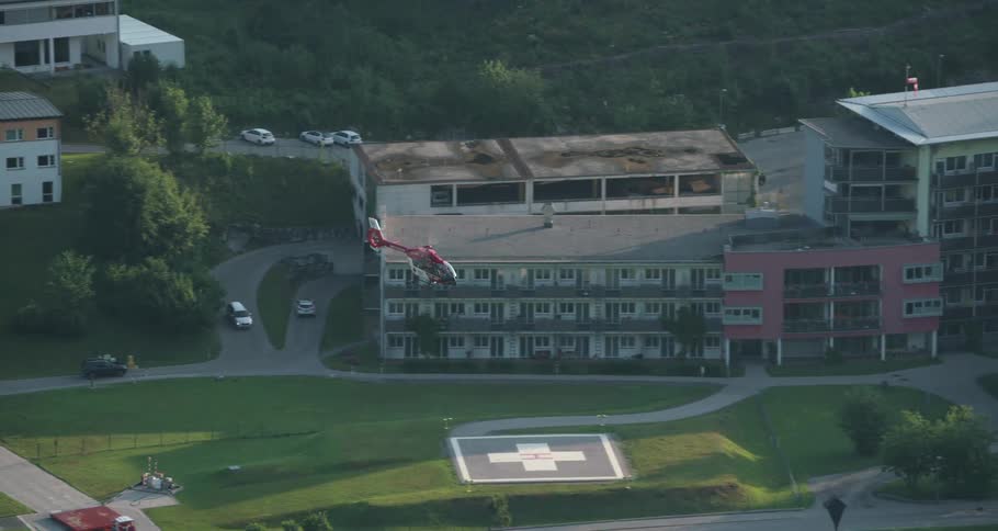A medical helicopter leaves a hospital