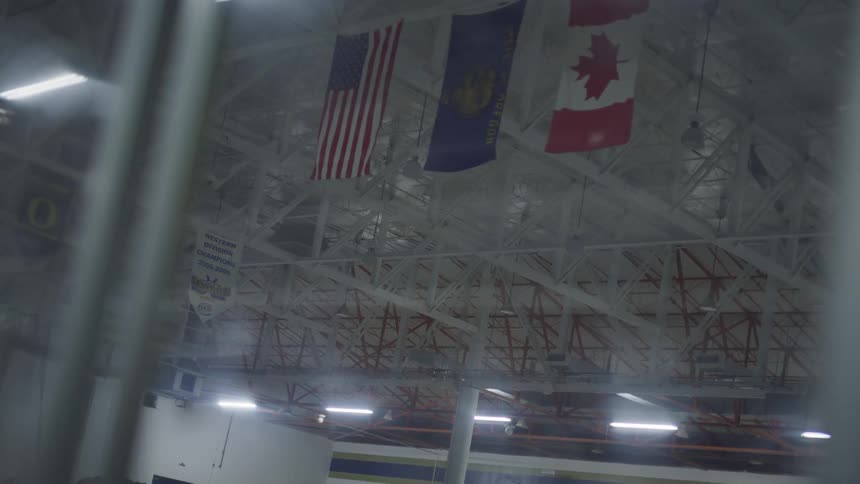 Flags hanging inside a building