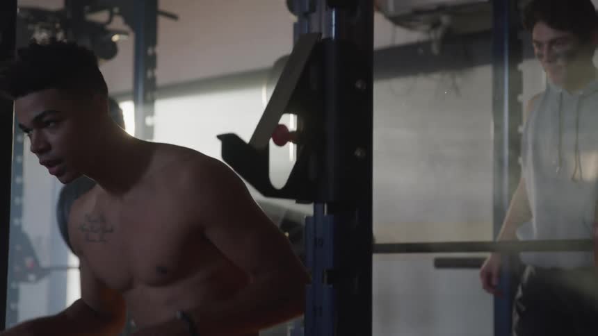 Man increases his motivation to work out in the gym