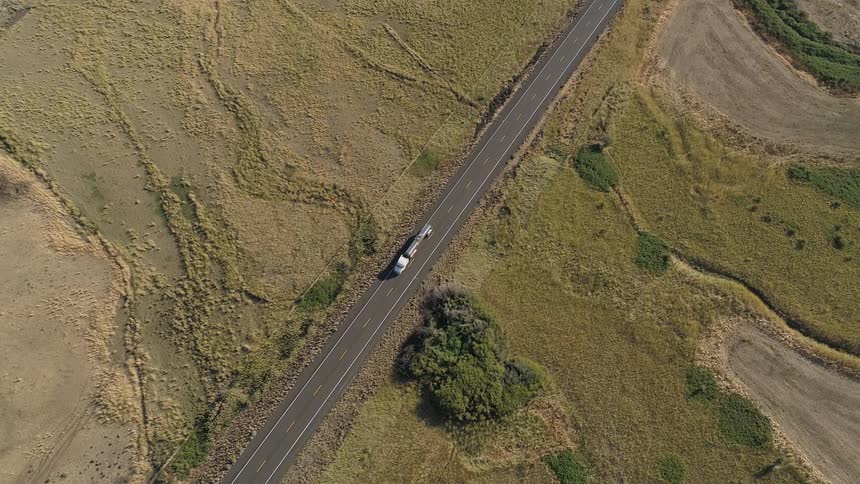 Aerial view of a tanker driving on the highway