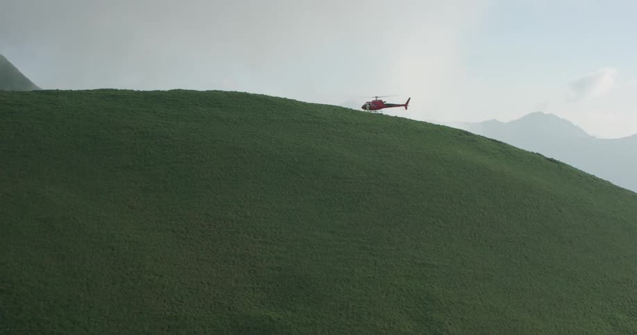 People rush out of the emergency helicopter