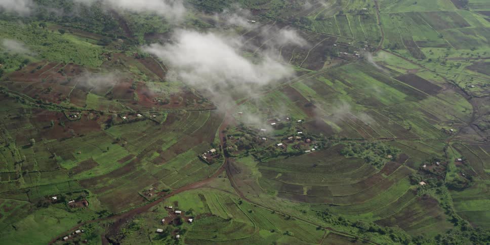 Photographers In Airplane Over African Wetlands