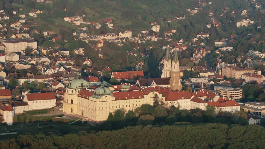 A church surrounded by buildings