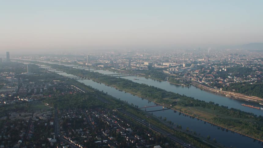 City and river under heavy fog