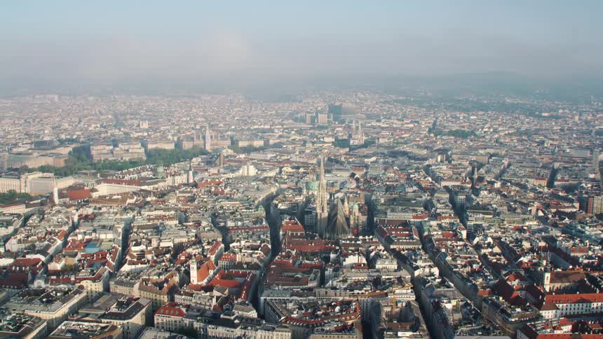 A church surrounded by buildings