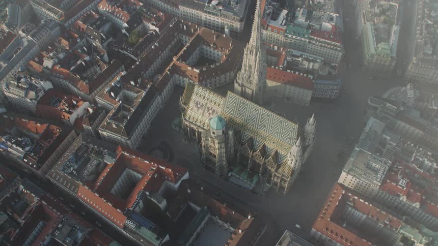 A church surrounded by buildings