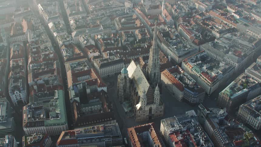 A large cathedral in a city during the day