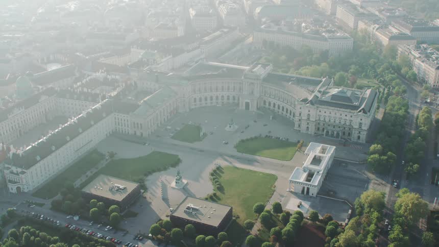 Fog covers town including part of ornate building grounds