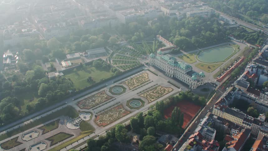 A large building with a decorative landscape in a city