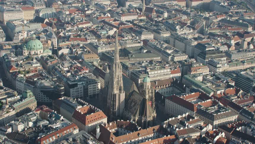 A church in the center of a city on a sunny day