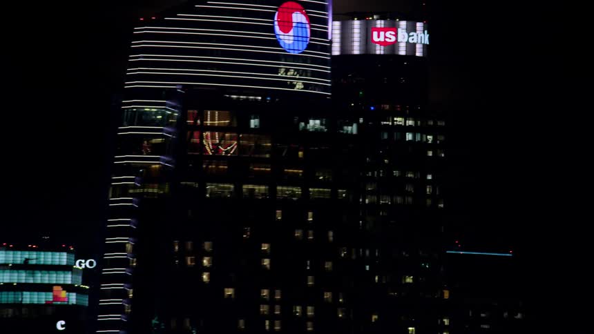 Full moon behind los angeles skyscrapers