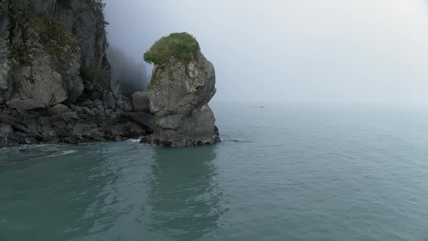 The coast is covered with heavy fog