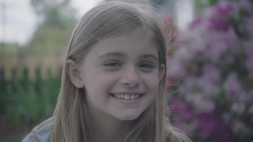 Young girl smiles for the camera