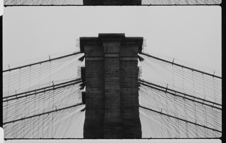 Vintage black and white film of brooklyn bridge in new york