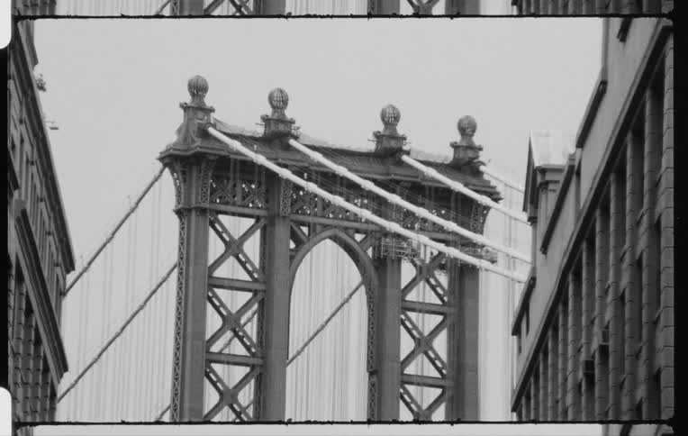 Building and bridge architecture stands out against clear sky