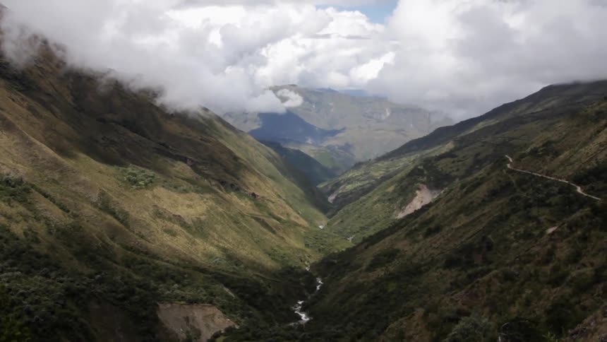 Clouds float over mountains