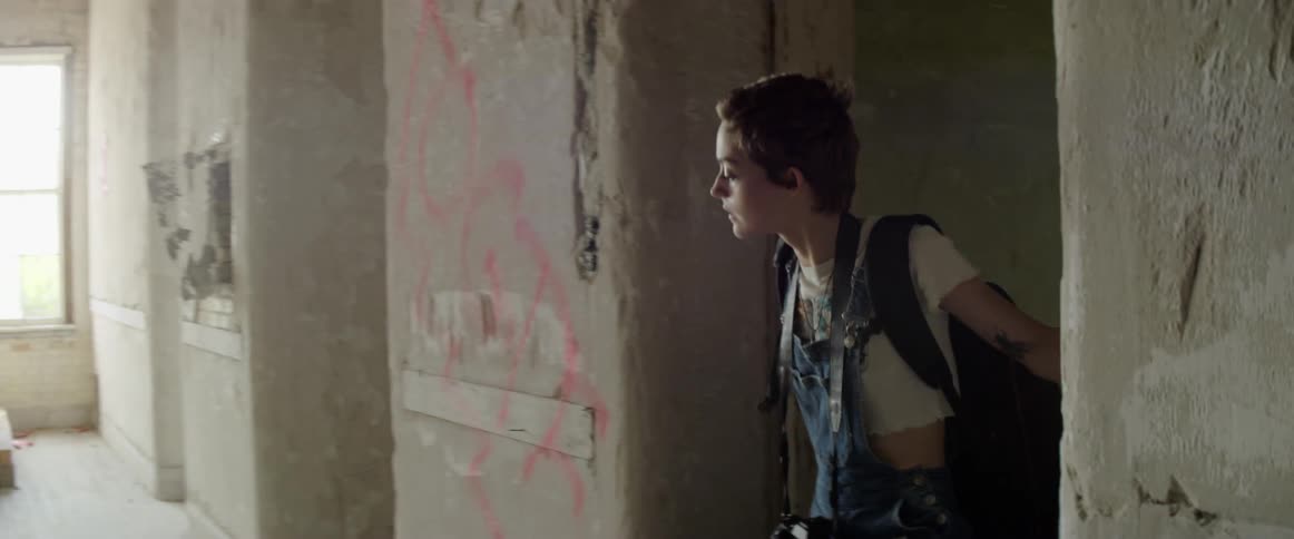 A woman searches the building