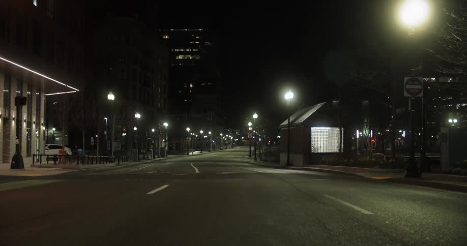 View of empty city highway during lockdown due to the coronavirus at night