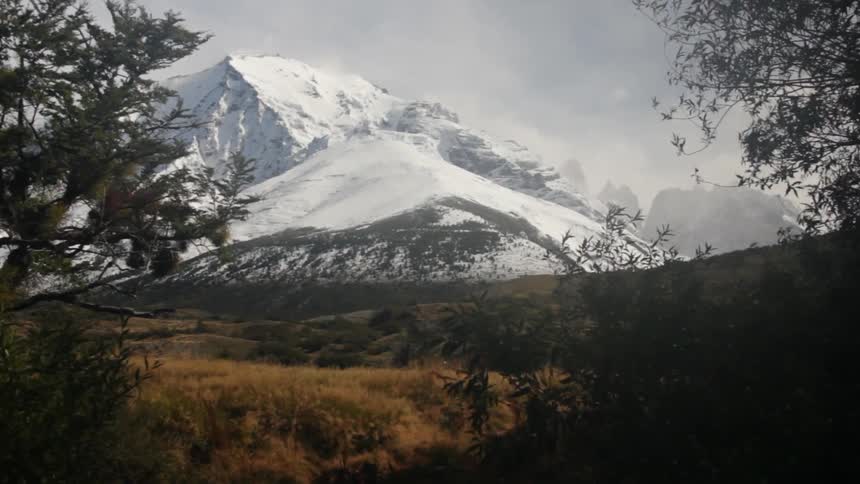 View of snow-covered mountains on a cloudy day