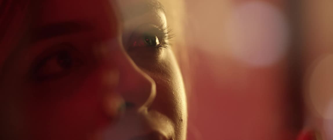 A female looks up and then down