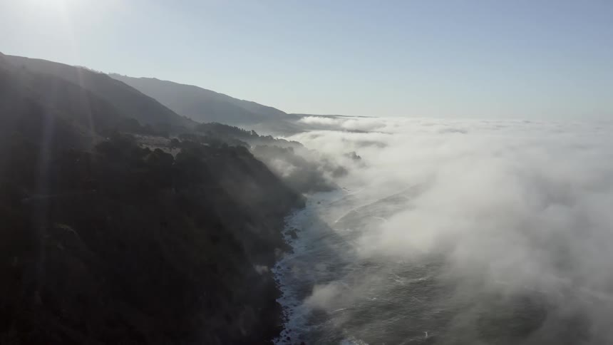 Mist over the water and shoreline